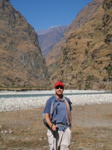 pc120196s Scott on the river flood plain, more mountains in the background