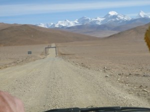 Mountains in the distance... a better stretch of road (just for the moment)