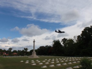 Strange combination of military plane, war memorial and cemetary