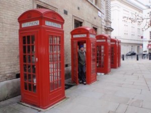 Scott in the traditional London phone boxes