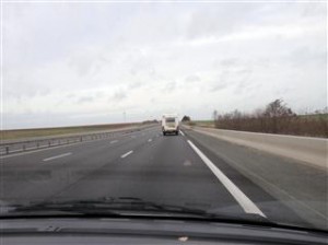 Vinnie and wind turbines on the road to Calais